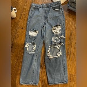 Light blue wash ripped baggy  jeans from RSQ. In a size 32